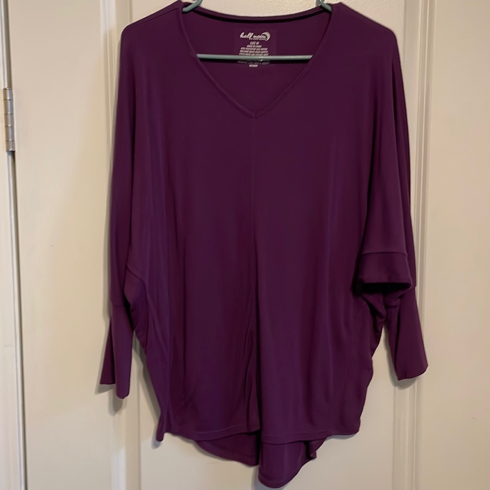 Women’s half moon sized medium batwing top